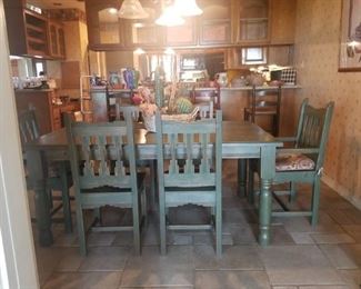 sage green rustic dining room table and 6 chairs
