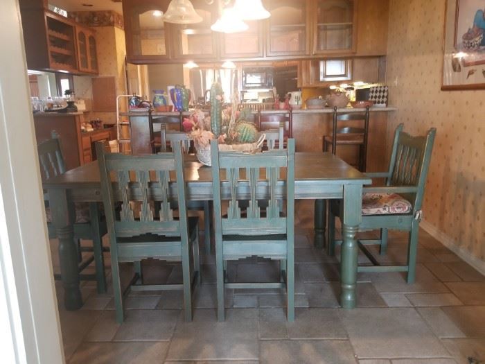 sage green rustic dining room table and 6 chairs