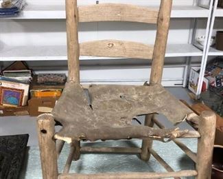 Primitive Wood Peg Chair with Cow hide seat
