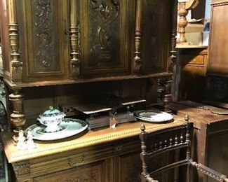 Carved Hunt cabinet