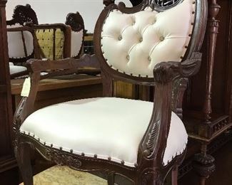 Carved mahogany chairs- one of several