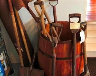 Antique shovels. A manure shovel from "Bagwell's Barn" in Gainesville, GA . Name carved in wood handle