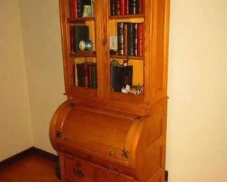 Oak barrel front secretary desk circa 1900