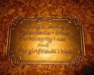 Brass plaque after the antique