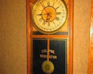 Eclipse regulator wall clock