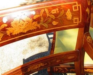 Detail a French inlaid armchair