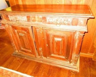 A beautifully carved 18th century cabinet