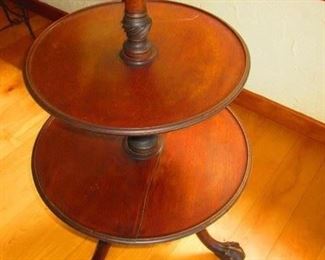 Late 19th century 3 tier  table with foot ball and claw feet