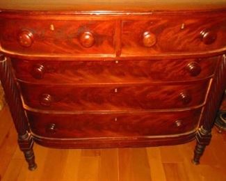 A flame mahogany vineyard chest of drawers circa 1830s /1840s