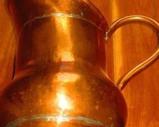 Large antique copper jug