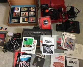 Atari 2600 system with 26 games and many instruction booklets
