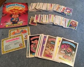 Garbage Pail Kids cards. About 40 of the large cards and about 250 of the smaller cards. The large cards will be sold separately from the smaller cards.