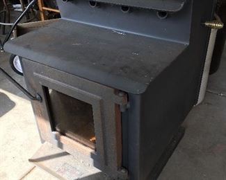 Wood burning stove by England Stove Works. Would be great for your cabin or garage!