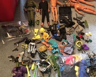 GI Joe figures and lots of weapons, clothing and miscellaneous items.