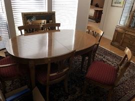 MID CENTURY OVAL FRUITWWOD DINING TABLE WITH 2 LARGE LEAVES, 2 ARM CHAIRS, 4 SIDE CHAIRS, MATCHING CHINA CABINET AND BUFFET ON FOLLOWING PHOTOS.
