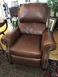 LEATHER LARGE SCALE ELECTRIC WALL HUGGER RECLINER. LIKE NEW. VERY COMFORTABLE FOR MAN OR WOMAN. RECLINES ALMOST ALL THE WAY FOR SLEEPING IF NECESSARY.