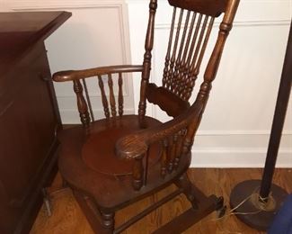 Antique oak office chair on wheels
