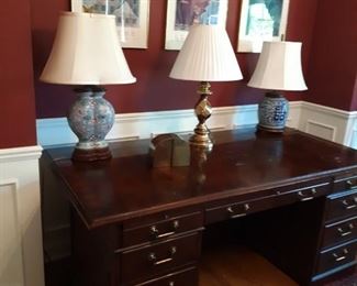 Solid mahogany desk, brass lamp, two Asian themed porcelain stoneware lamps