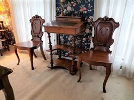 Antique English rosewood desk with a pair of William IV mahogany side chairs