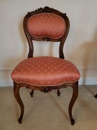 Pair of antique French Louis XV style walnut side chairs