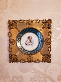Pair of Austrian porcelain plates depicting portraits of Napoleon and Josephine
