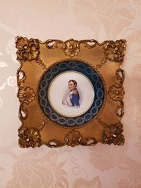 Pair of Austrian porcelain plates depicting portraits of Napoleon and Josephine