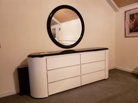 General Mica white laminate dresser with black laminate top and round framed mirror