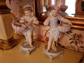 Pair of Dresden bisque porcelain children figures