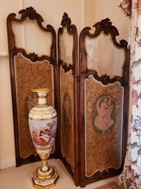 Three section French carved mahogany dressing screen with beveled glass and three tapestry panels and an antique porcelain Royal Vienna urn with damage