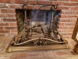 Beautiful brass fire fender and a pair of French brass andirons