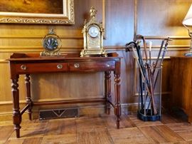 Antique walnut huntboard, an English umbrella stand with canes