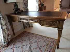 Kargas Furniture Co. Oriental style writing desk and a needlepoint area rug