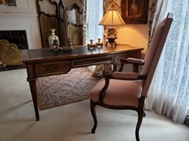 Kargas Furniture Co. Oriental style writing desk and an open armchair