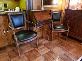 Pair of leather upholstered directoire chairs, an antique English drop front desk