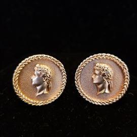 Pair of 14k yellow gold cufflinks with small diamond chips