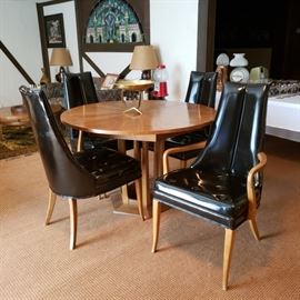 Mid Century Modern black upholstered chairs with round table