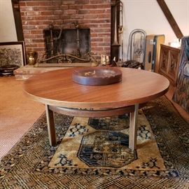 American of Martinsville round coffee table with brass trim legs