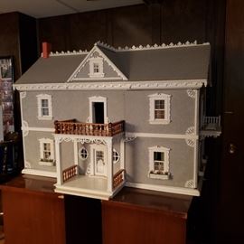 Custome made doll house by Louis Kromnacker modeled after a 19th century American Federal home. Lighted and fully furnished