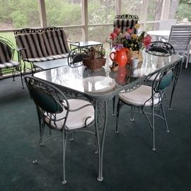 Glass top aluminum patio table and chairs