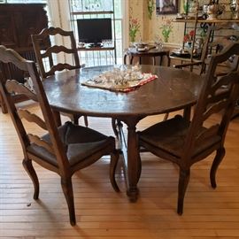 French style oak table with four side chairs and two armchairs