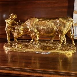 French cast and gilded bronze group depicting a man with a team of oxen