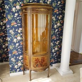 One of a pair of antique French display cabinets
