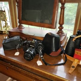 Collection of cameras and binoculars