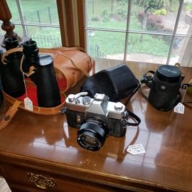 Collection of cameras and binoculars
