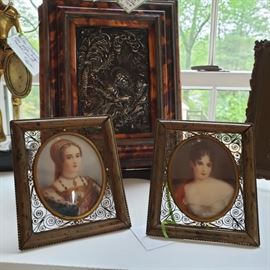 Pair of miniature portraits in bronze and tortoise frames