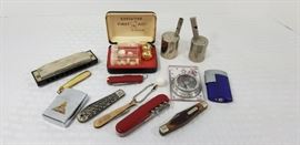 collection of a variety of pocket knives, lighters and more           https://ctbids.com/#!/description/share/146673