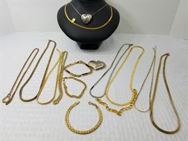 collection of costume jewelry some gold-plated necklaces and bracelets https://ctbids.com/#!/description/share/146693