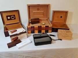Collection of wooden cigar humidors and cigar boxes  https://ctbids.com/#!/description/share/146702