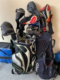 Taylormade woods & irons Scotty Cameron putters