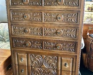 Ornately Carved antique chest with 6 drawers